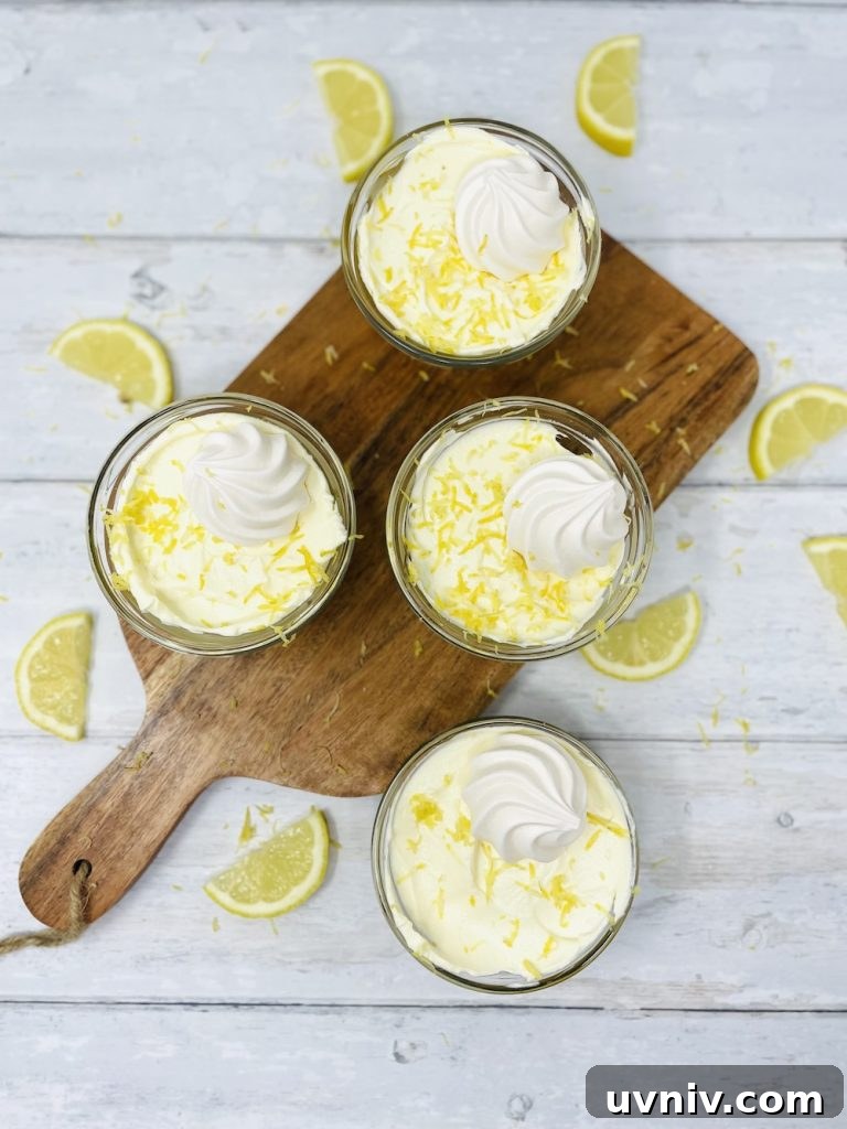 no bake lemon cheesecake pots on a wooden board