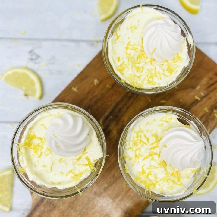 no bake lemon cheesecake pots on a wooden board