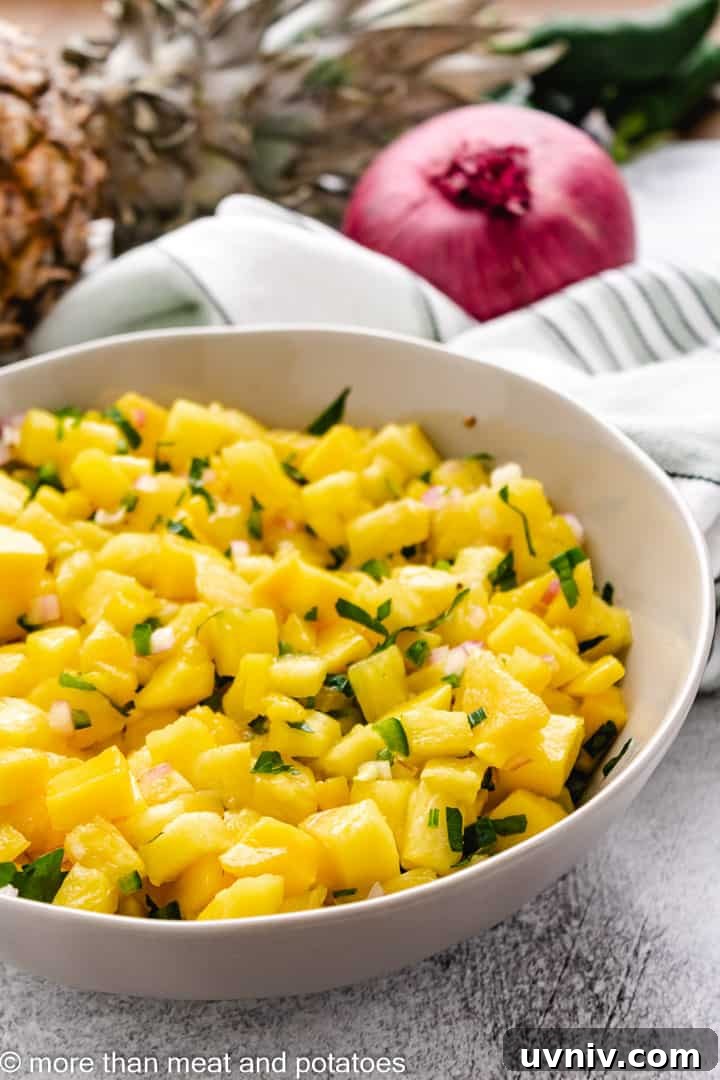 Close up view of pineapple mango salsa.
