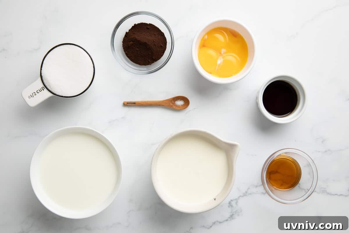 Homemade Espresso Ice Cream Recipe — Rich Coffee Gelato 3 Heavy cream, espresso powder, egg yolks, vanilla, coffee liqueur, sugar and salt in dishes set up on a counter.