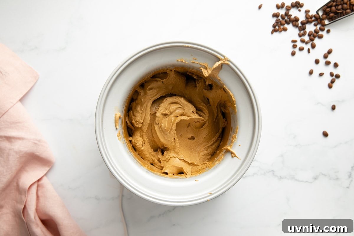 Homemade Espresso Ice Cream Recipe — Rich Coffee Gelato 6 Finished churned espresso ice cream in an ice cream maker.