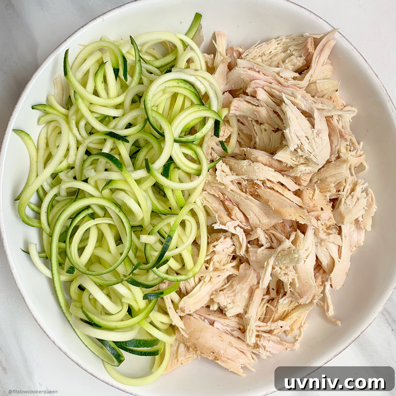 Zoodles lighten up this low-carb, paleo, and whole30 chicken soup recipe that can be made in your slow cooker or Instant Pot.