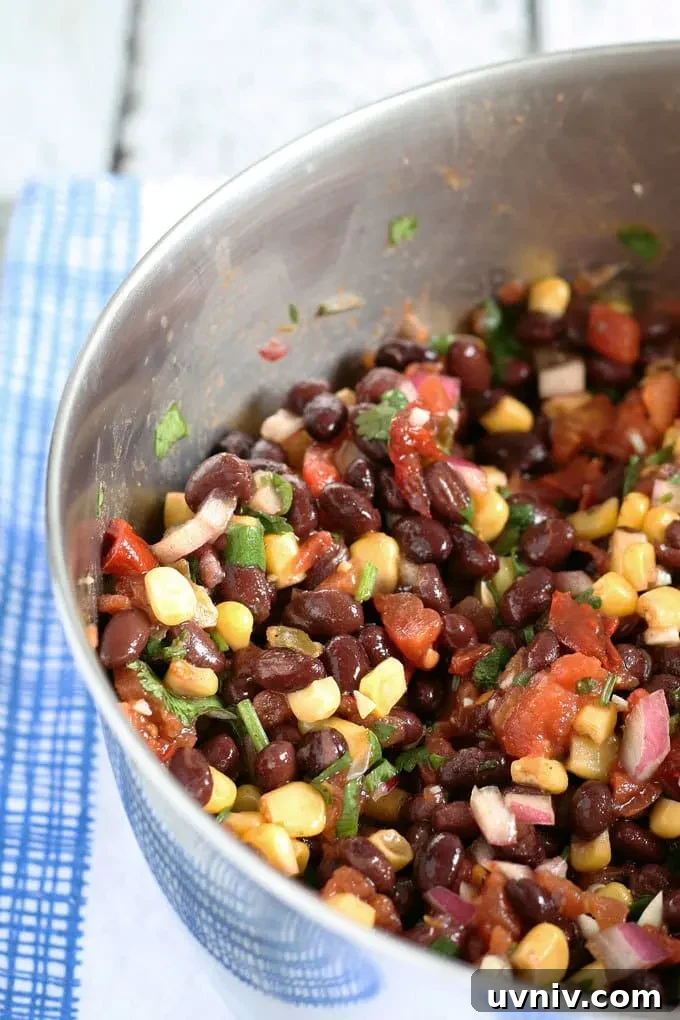 no cook corn black bean salsa in a metal bowl