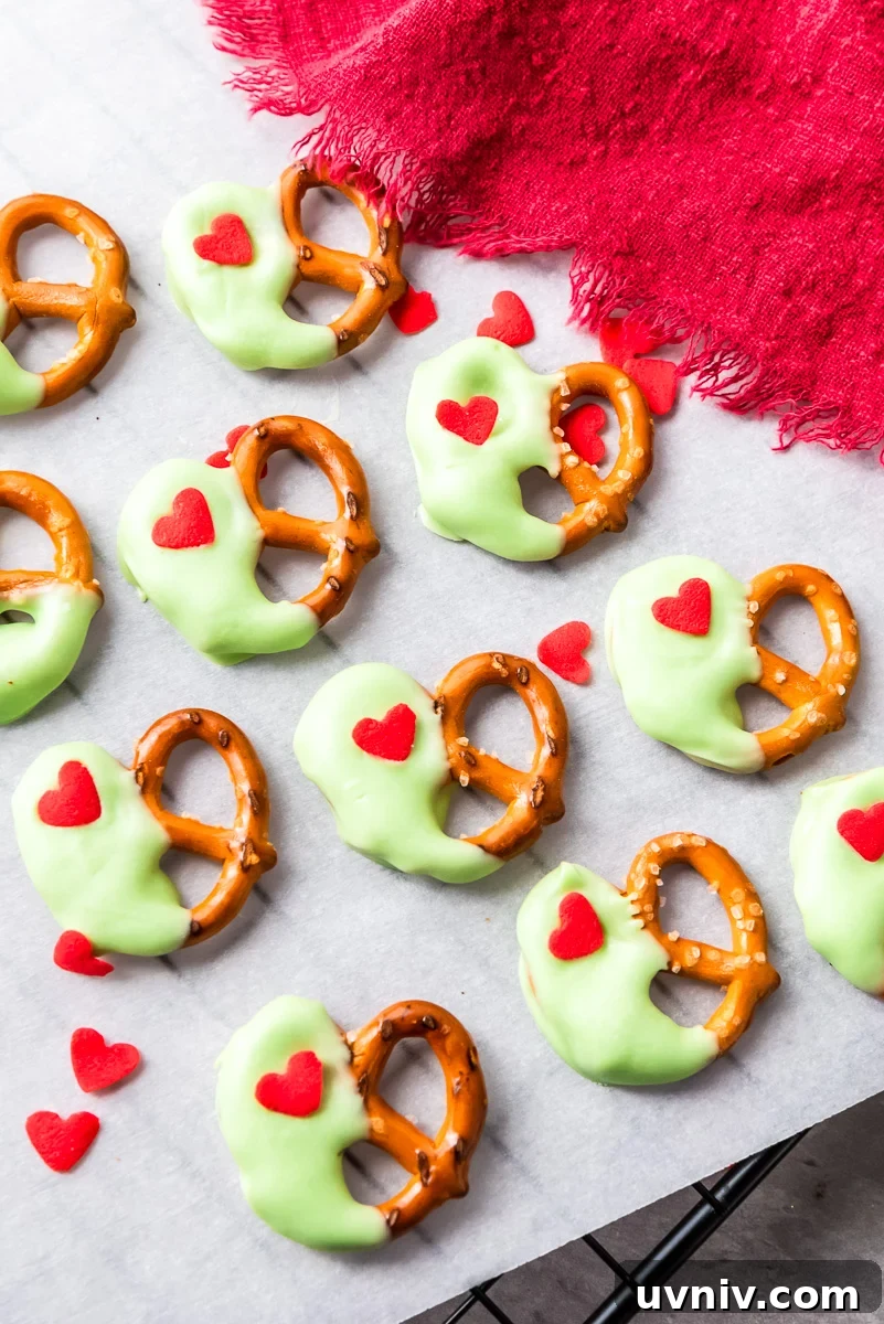 Grinch-themed chocolate dipped pretzels
