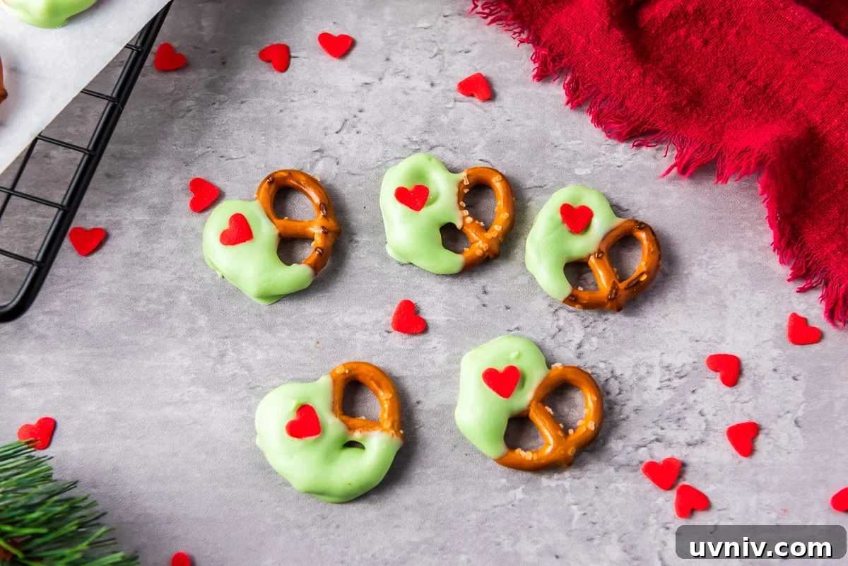 Finished Grinch pretzels on a tray