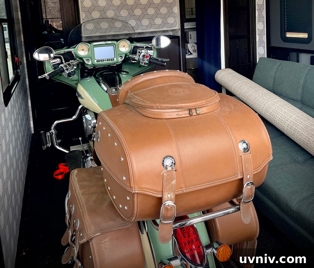 Our motorcycle inside the garage of our 5th wheel RV.