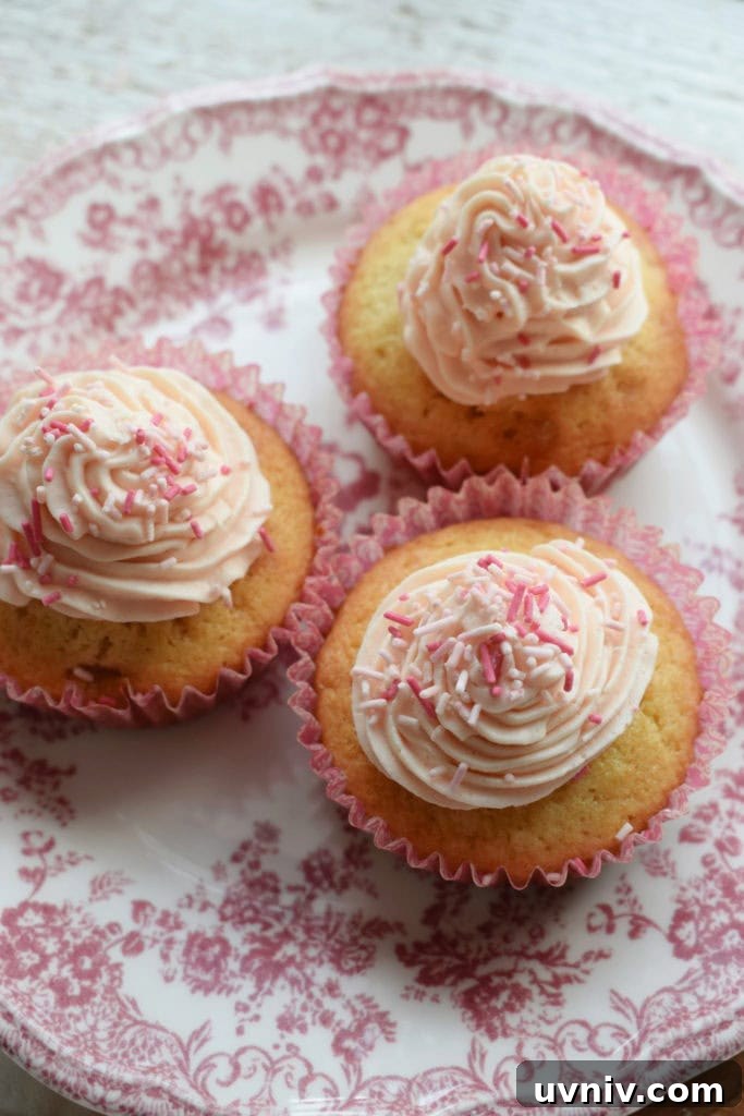 Fresh Strawberries with Buttercream Frosting on a pink pretty plate