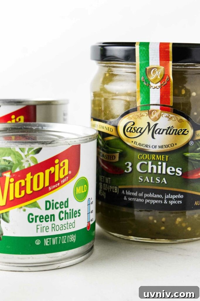 Two cans of diced green chiles and a jar of green chile salsa.